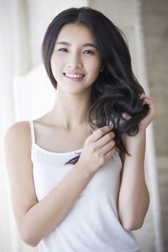 Young Chinese woman with long hair Young Chinese woman with long hair